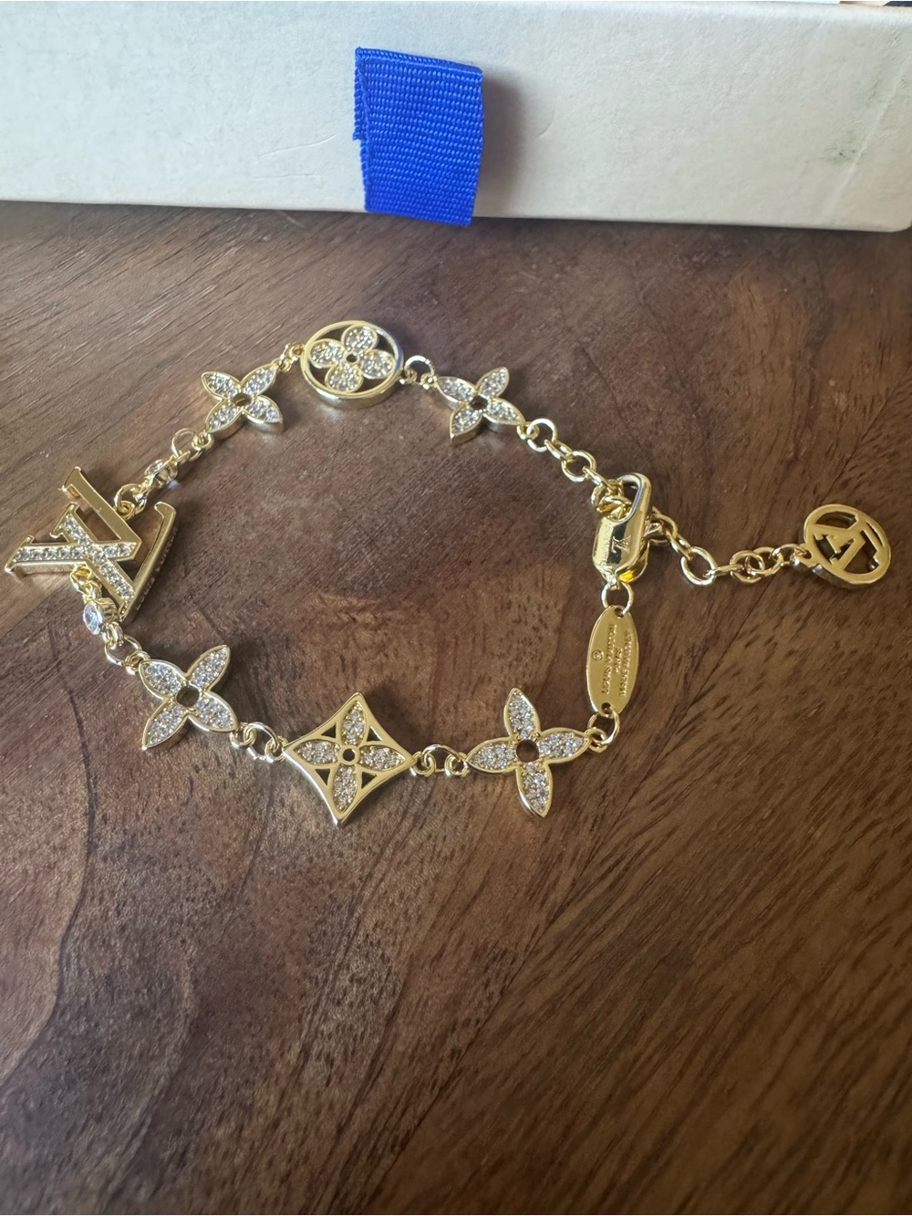 Louis Vuitton Gold Charm Bracelet with Monogram Motifs - Picture 9 of 13